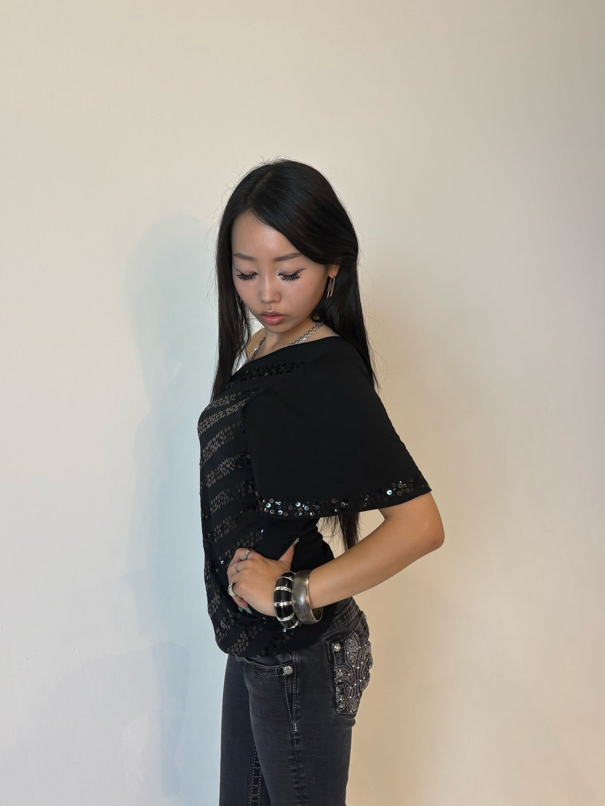 BEBE Obsidian One-Shoulder Sequin Top