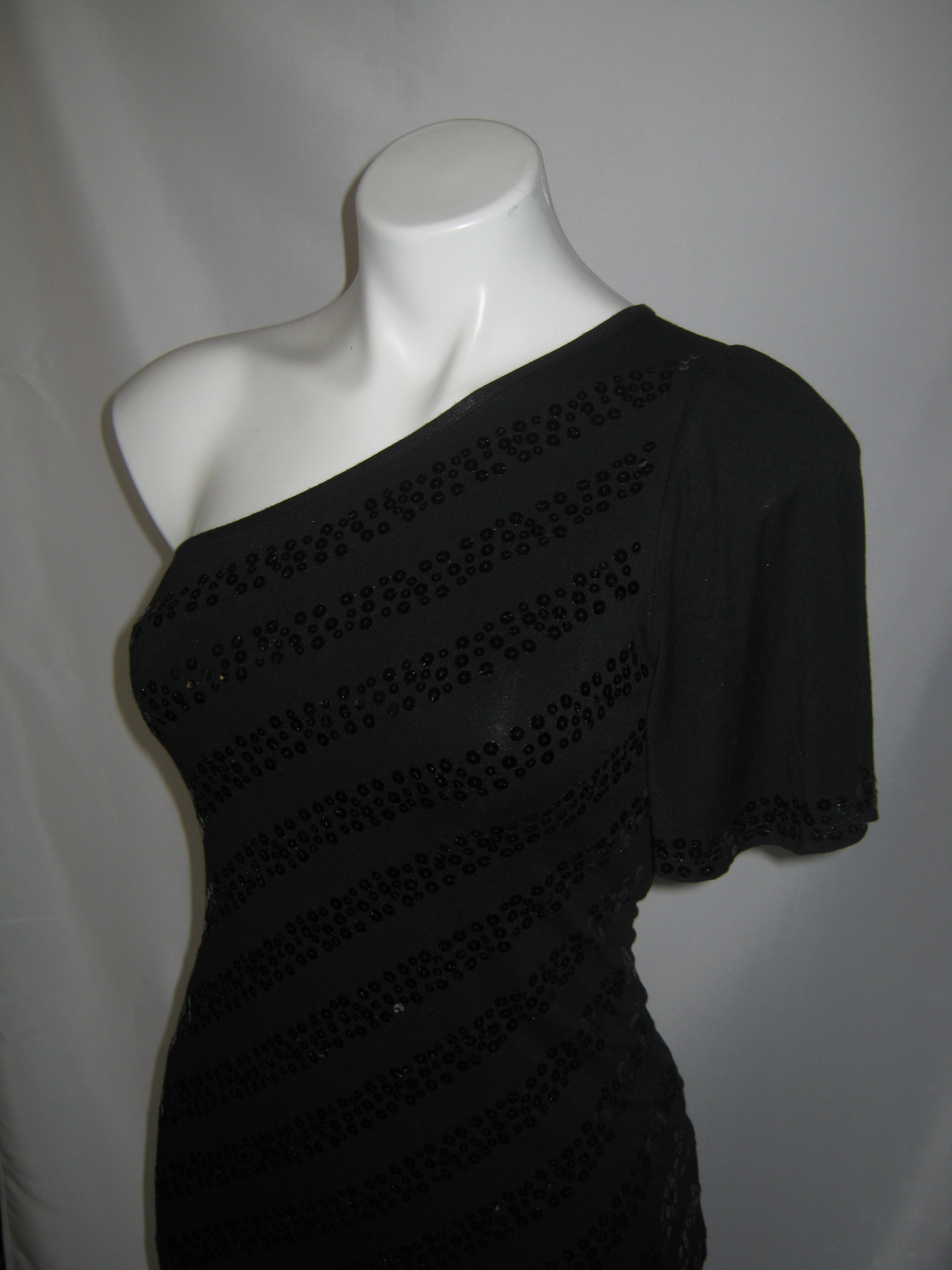 BEBE Obsidian One-Shoulder Sequin Top